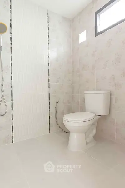 Modern bathroom with sleek tiles and contemporary fixtures