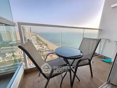 Stunning balcony with ocean view, perfect for relaxation and enjoying the coastal skyline.