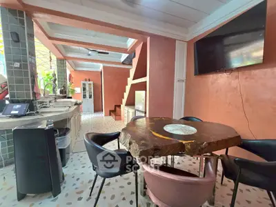 Charming kitchen with rustic wooden table and modern appliances