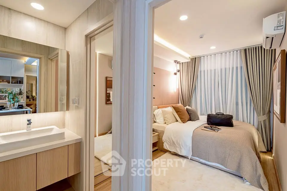Modern bedroom with ensuite bathroom in stylish apartment