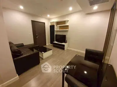 Modern living room with sleek furniture and ambient lighting