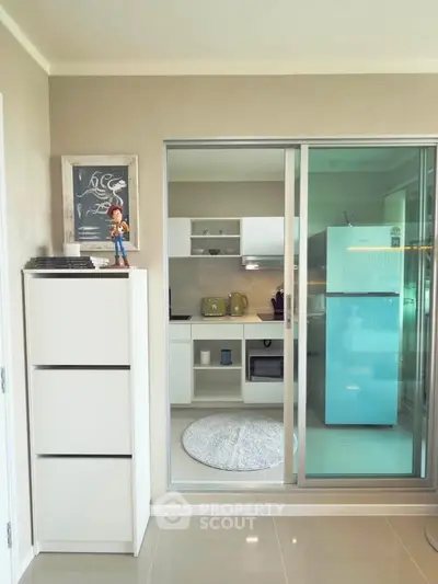 Modern kitchen with sliding glass doors and stylish decor