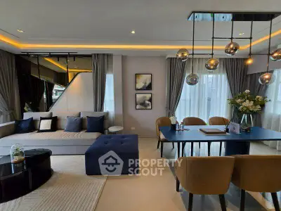 Luxurious modern living room with elegant dining area and stylish decor