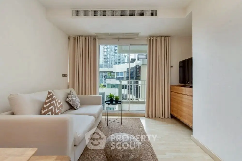 Modern living room with balcony view in urban apartment