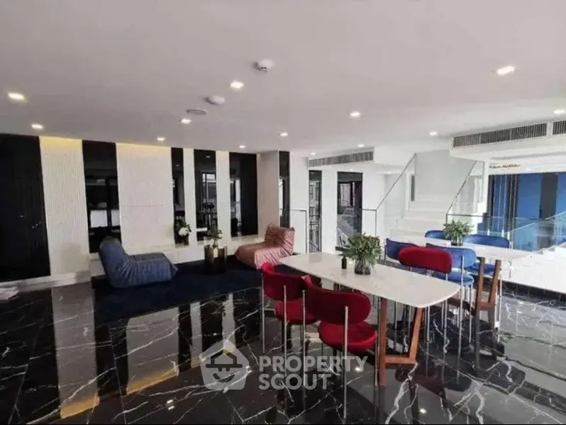 Luxurious modern living room with marble floors and stylish furniture