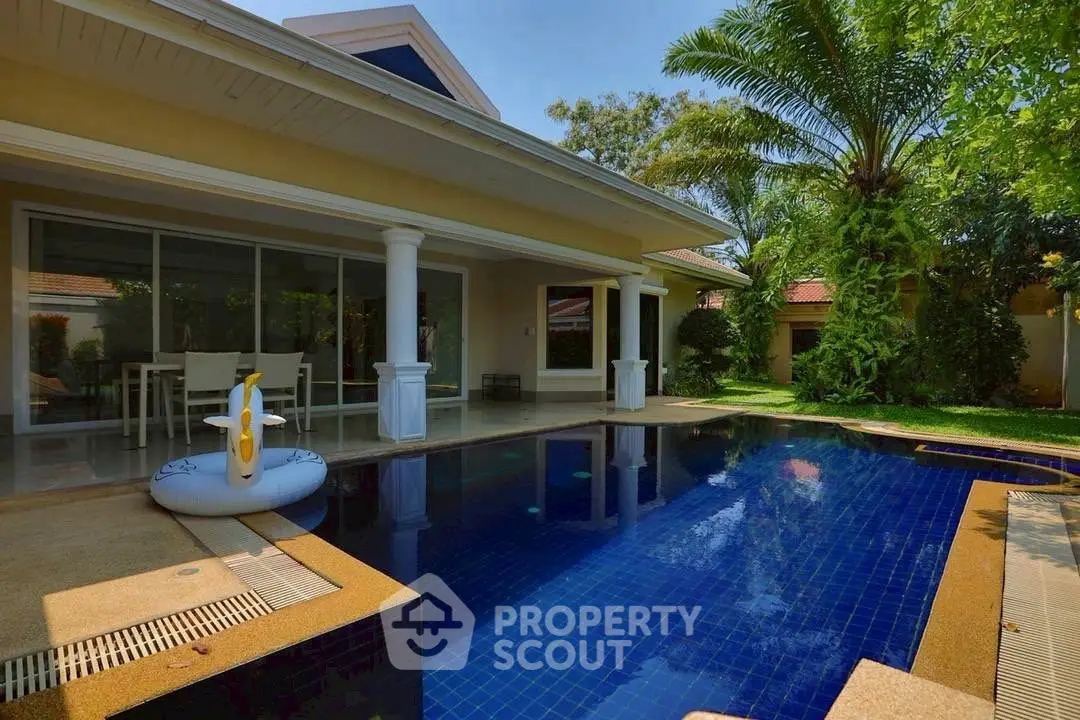 Luxurious villa with private pool and lush garden, perfect for relaxation and entertaining.