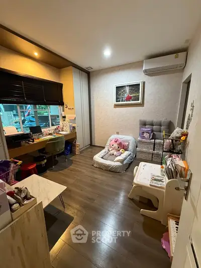 Cozy children's playroom with modern decor and ample natural light