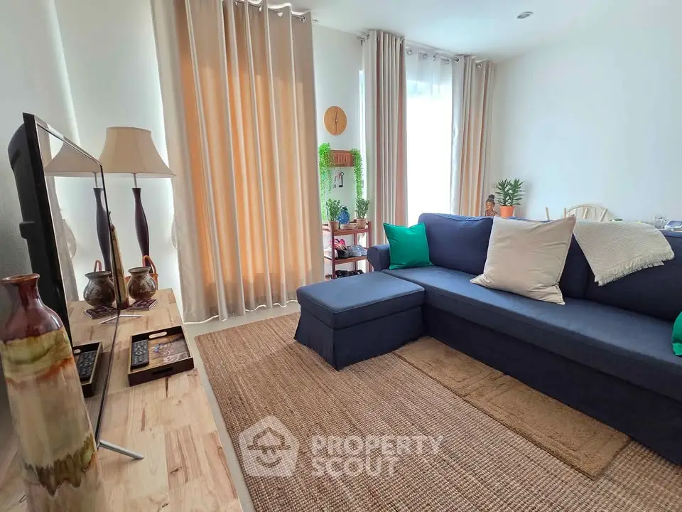 Cozy living room with modern decor and natural light