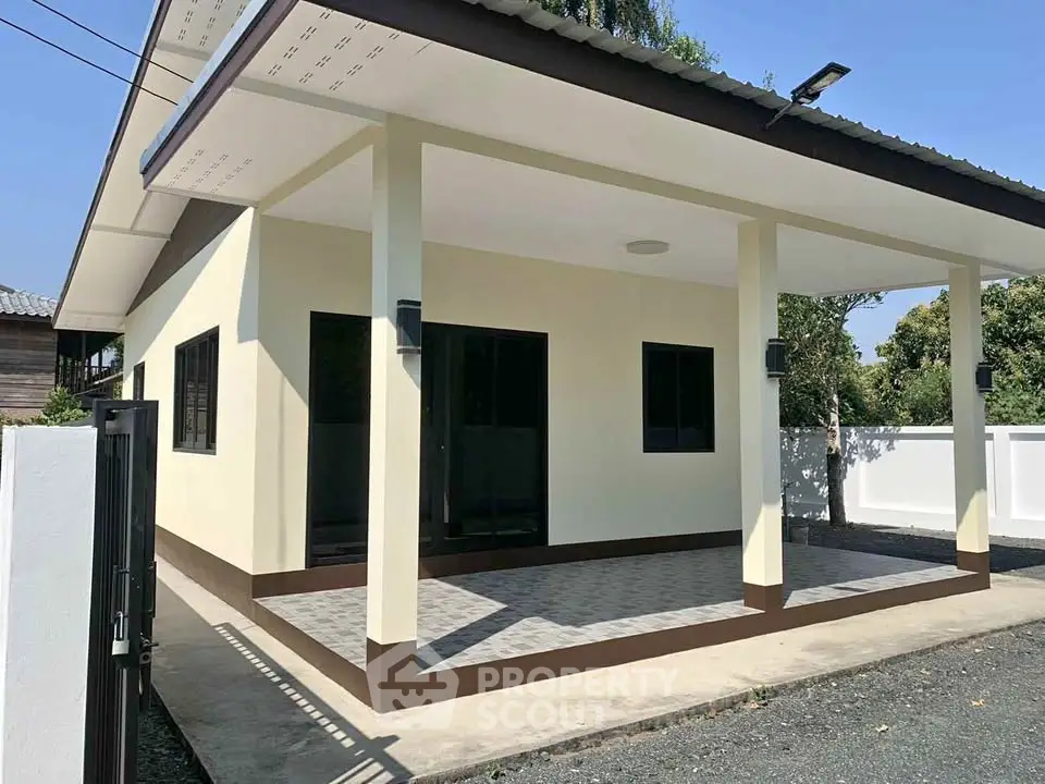 Modern single-story house with spacious covered patio and minimalist design.