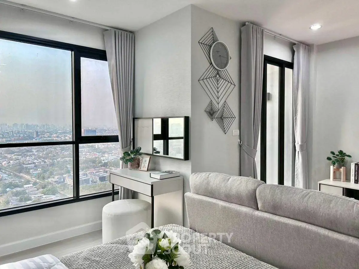 Modern living room with stunning city view and elegant decor