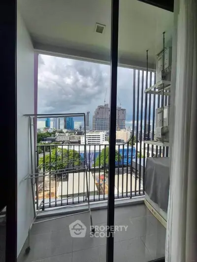 Modern balcony with city view, ideal for urban living, featuring sleek railing and ample space for relaxation.