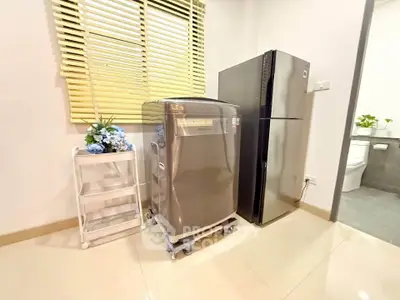 Modern kitchen with sleek appliances and stylish decor