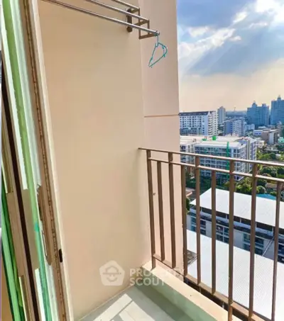 Charming balcony with city view, perfect for relaxation and enjoying the skyline.