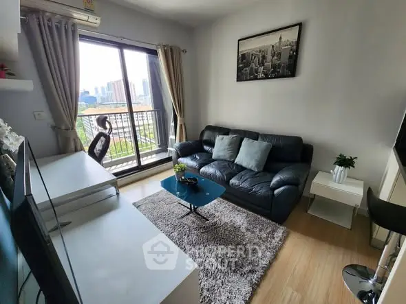 Modern living room with city view, featuring a cozy sofa, stylish decor, and large windows for natural light.