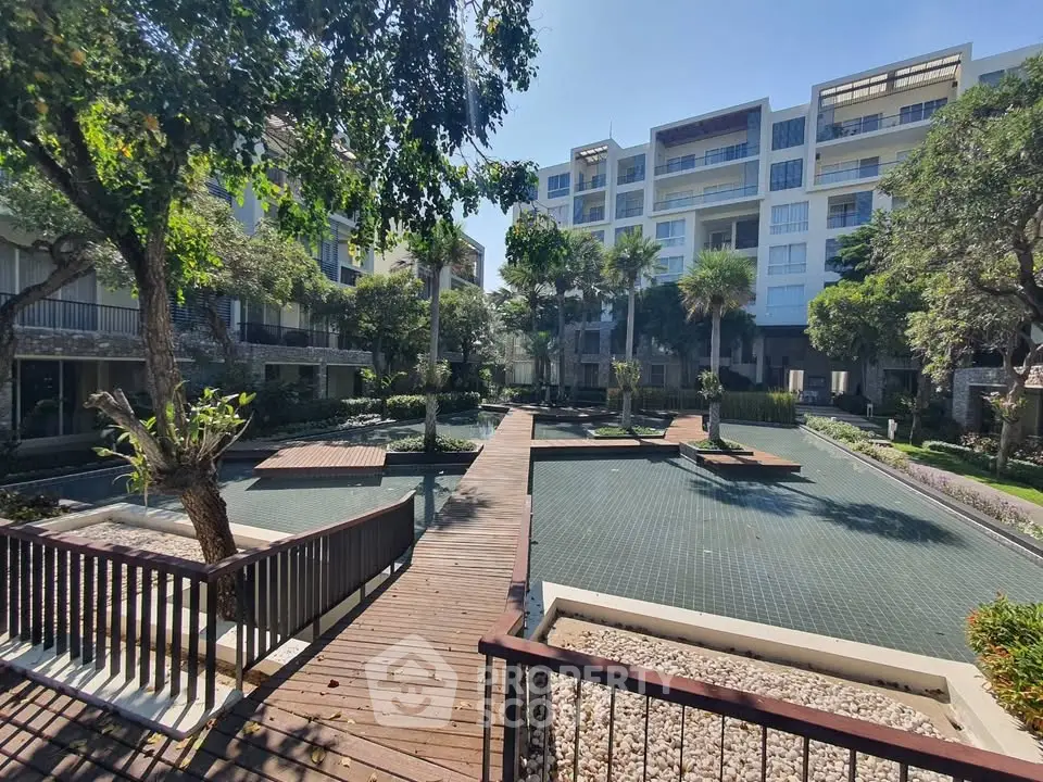 Luxurious residential complex with serene garden and water features