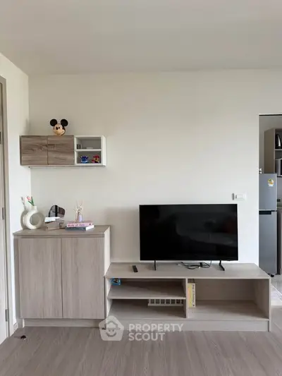 Modern living room with sleek TV stand and minimalist decor