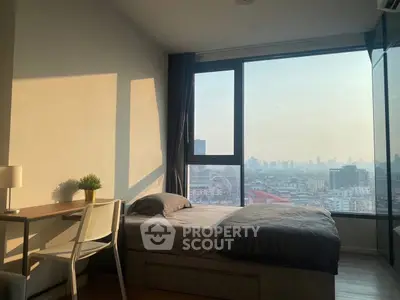 Modern bedroom with stunning city view and natural light