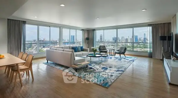Spacious living room with panoramic city view and modern decor