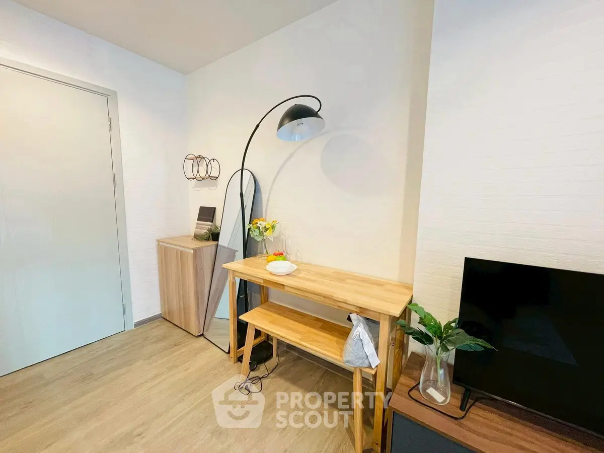 Modern living room corner with stylish furniture and decor