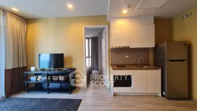 Modern living room with open kitchen and sleek appliances