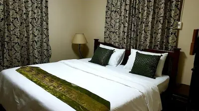 Cozy bedroom with elegant decor and comfortable bedding