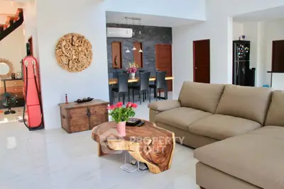 Spacious modern living room with elegant wooden furniture and open dining area