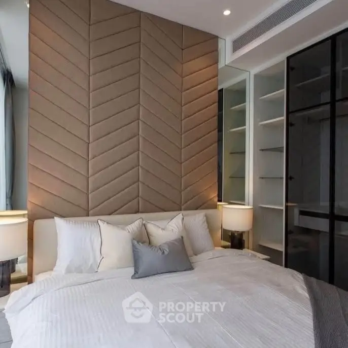 Luxurious modern bedroom with elegant design and ample natural light