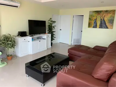 Spacious living room with modern furniture and stylish decor