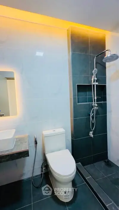 Modern bathroom with sleek shower and ambient lighting