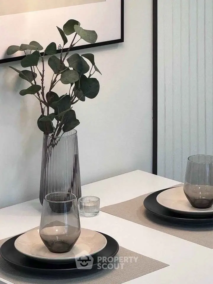 Elegant dining setup with modern decor and stylish tableware