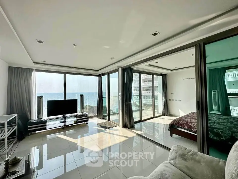 Luxurious beachfront living room with stunning ocean view and modern decor