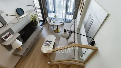 Modern living room with stylish decor and city view from balcony, featuring cozy seating and elegant dining area.