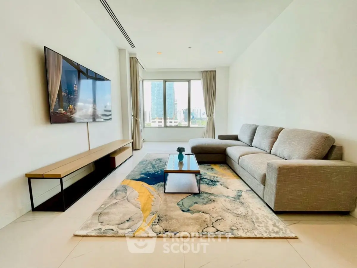Modern living room with sleek furniture and city view, perfect for urban living.