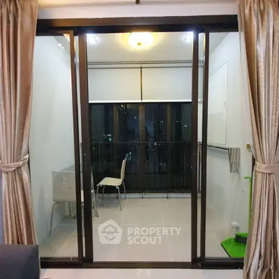 Modern apartment balcony with city view and elegant curtains