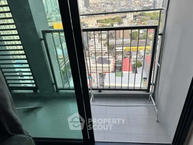 Stunning city view from a high-rise balcony, perfect for urban living enthusiasts.