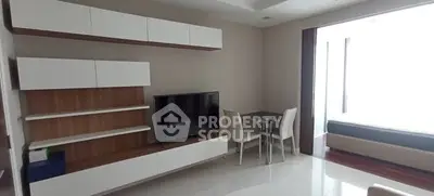 Modern living room with sleek furniture and natural light