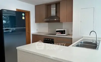 Modern kitchen with sleek appliances and stylish cabinetry