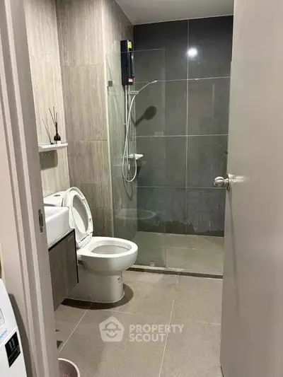 Modern bathroom with glass shower and sleek design