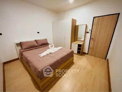 Cozy bedroom with modern furniture and elegant decor