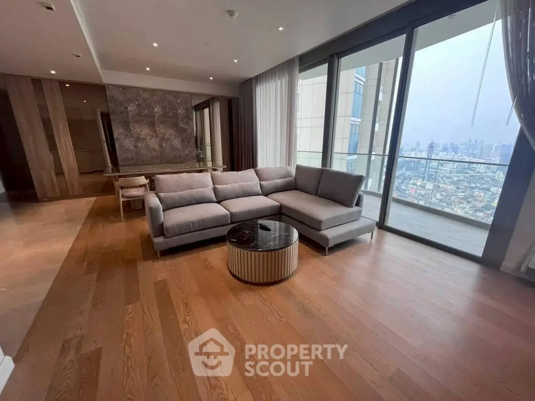 Spacious living room with city view and modern furniture in luxury apartment