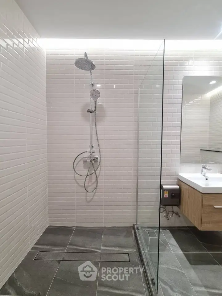 Modern bathroom with sleek shower and stylish vanity