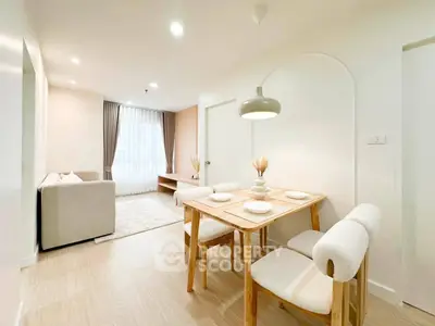 Bright and modern living room with dining area in open layout apartment