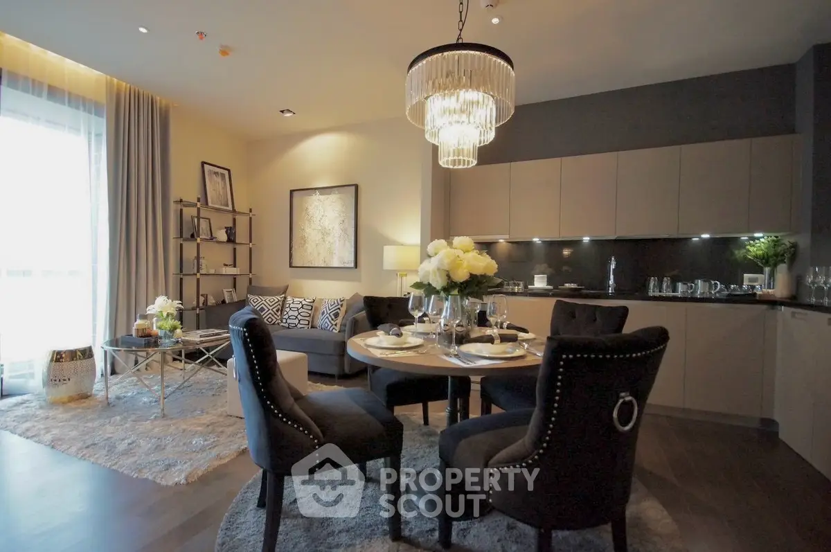 Luxurious open-plan living room with elegant dining area and modern kitchen