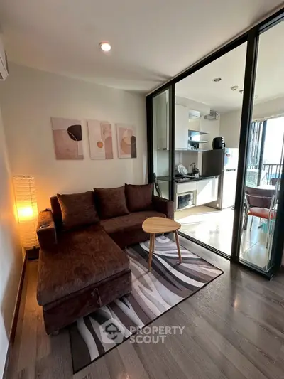 Modern living room with cozy brown sofa and stylish decor