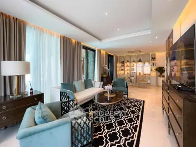 Luxurious living room with elegant decor, plush seating, and stylish lighting in a modern apartment.
