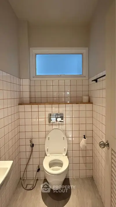 Modern bathroom with sleek design and natural lighting