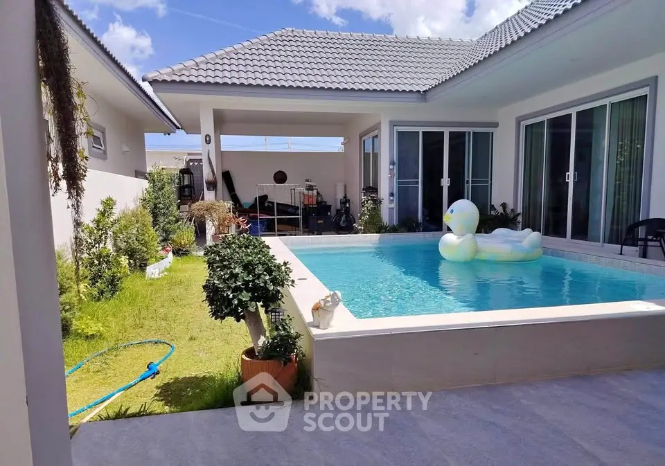 Charming modern home with private pool and lush garden, perfect for relaxation and entertaining.