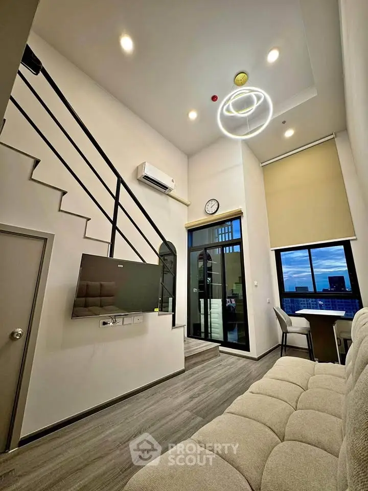 Modern loft apartment with high ceilings and stylish interior design