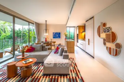 Spacious modern living room with open kitchen and large balcony overlooking lush greenery.