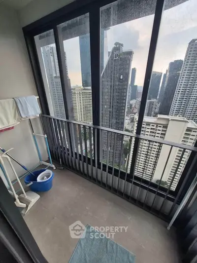 High-rise balcony with stunning cityscape view, perfect for urban living enthusiasts.